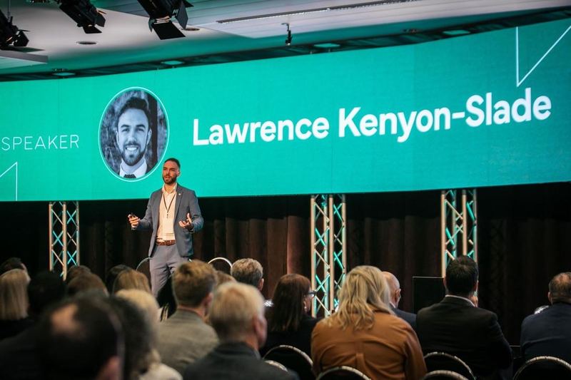 Lawrence speaking at NZREC